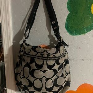 Stylish Black and Cream Coach Bag
